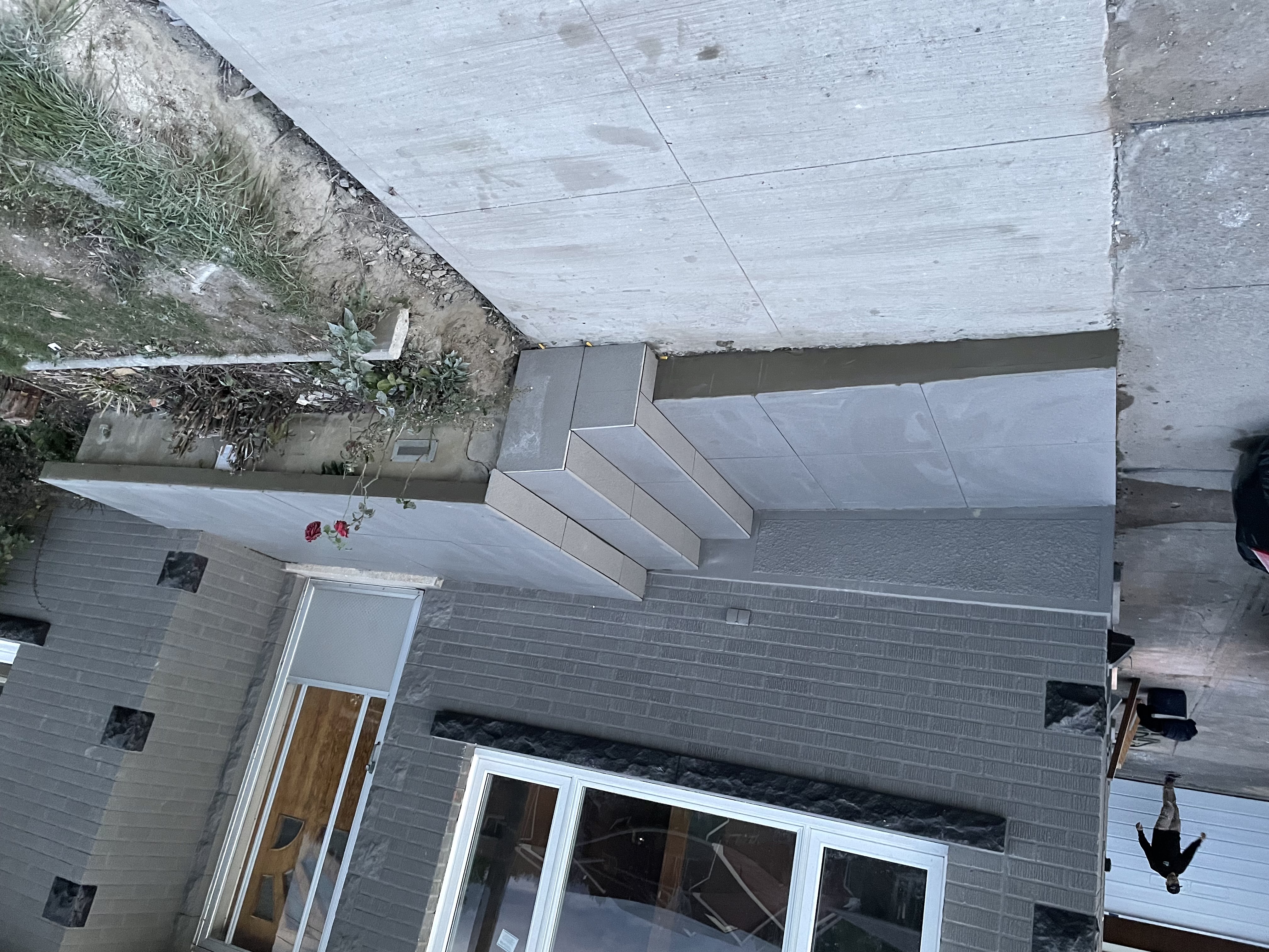 New porcelain tile front steps after Ali's renovation